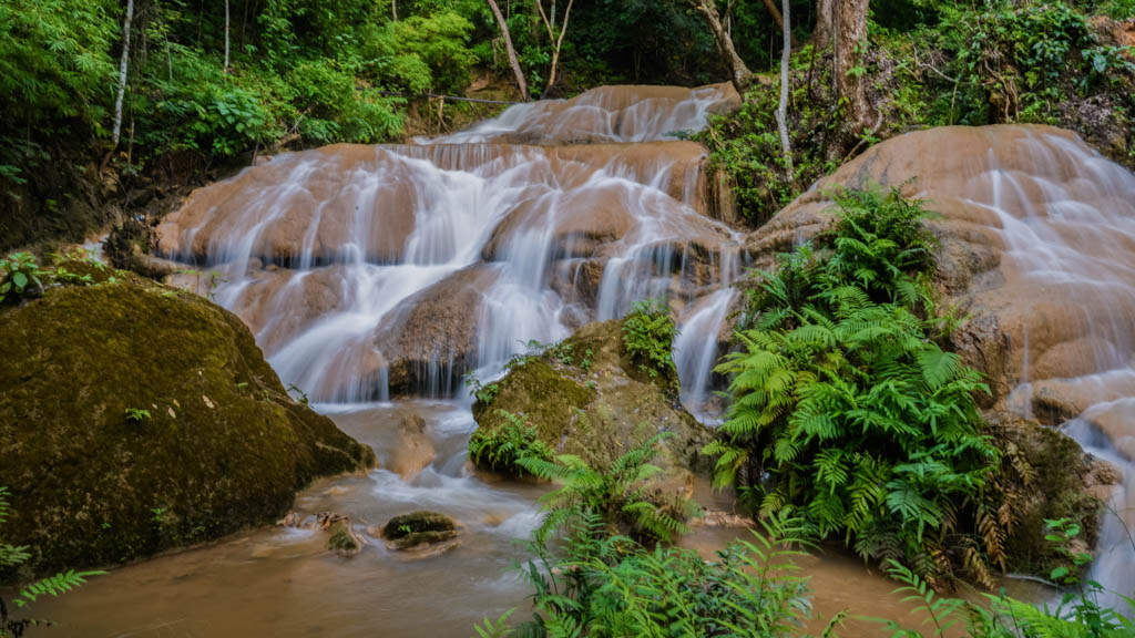 Sri Sangwan Waterfall limestone cascade in Chiang Dao forest, Chiang Mai Thailand